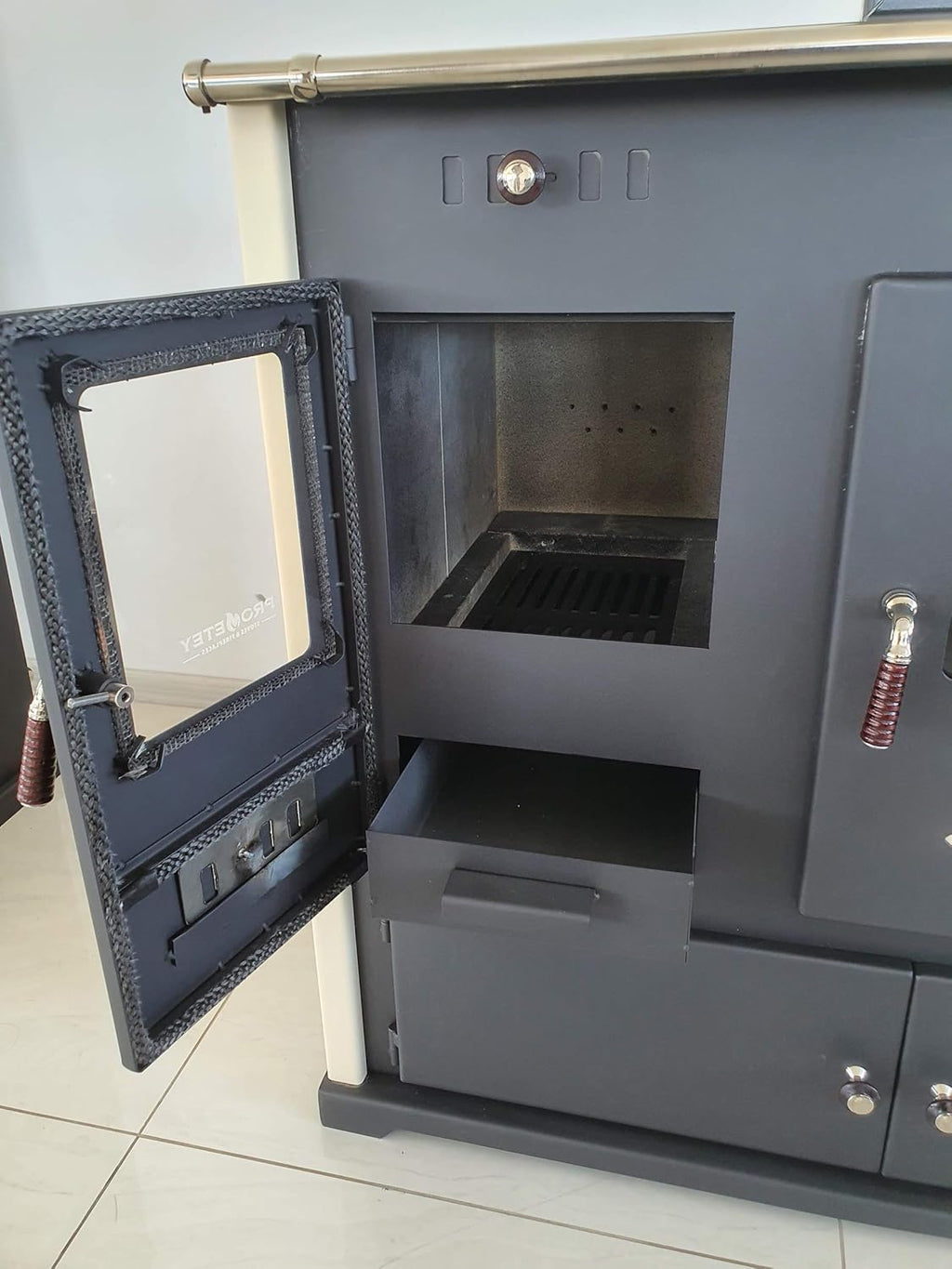 Estufa de leña Practik Lux de metal, 9,5 kW, con compartimento y placa de cocción
